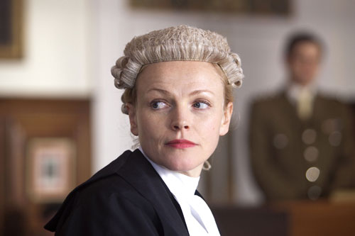 Martha Costello (Maxine Peake) stands in court in wig and gown