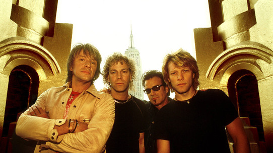 Bon Jovi photo by Fin Costello (Redferns)