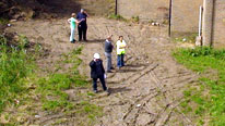 people on site of garden
