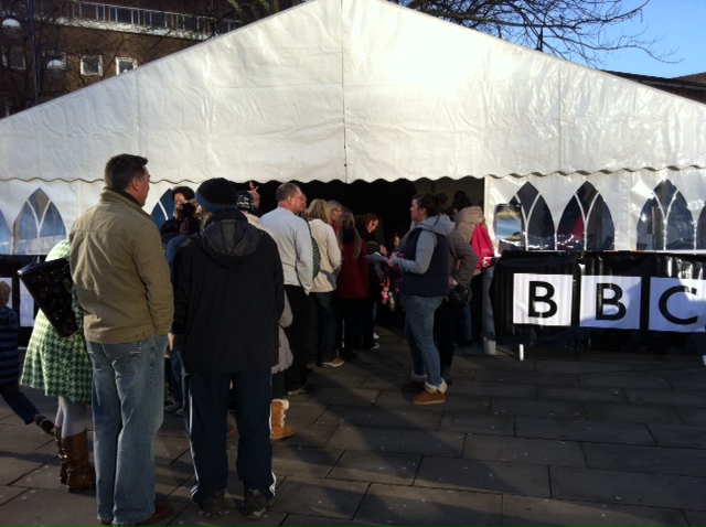 A picture of a queue of people waiting to gain entry to watch Stargazing Live on a big screen in Swansea. 