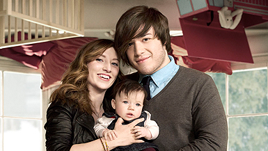 young parents in upside-down nursery