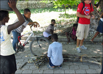 A vendor selling sugar cane