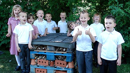 school children in garden