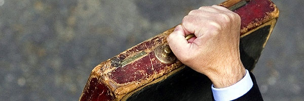 Chancellor of the Exchequer holds the original budget box as he leaves 11 Downing Street 