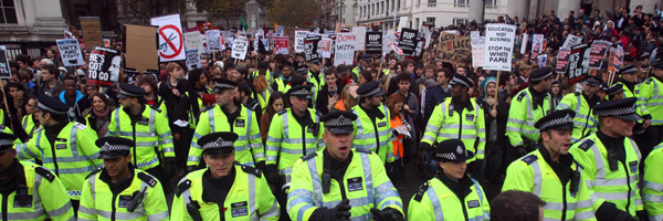 Police at the student fees protest march in London
