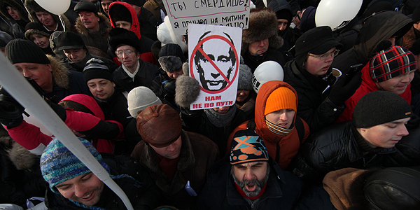 Russian oppostion activists take part in a rally and march to Bolotnaya Square on February 4, 2012 in Moscow, Russia.