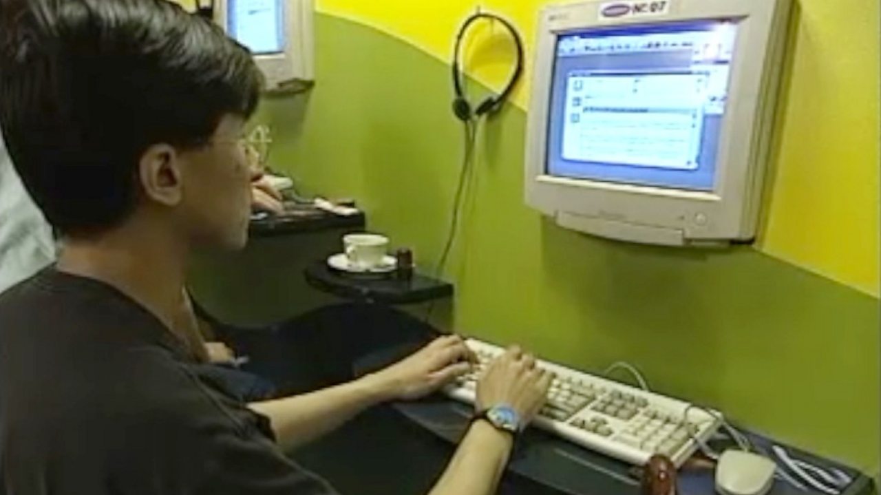 Auction website bids for business, 1998