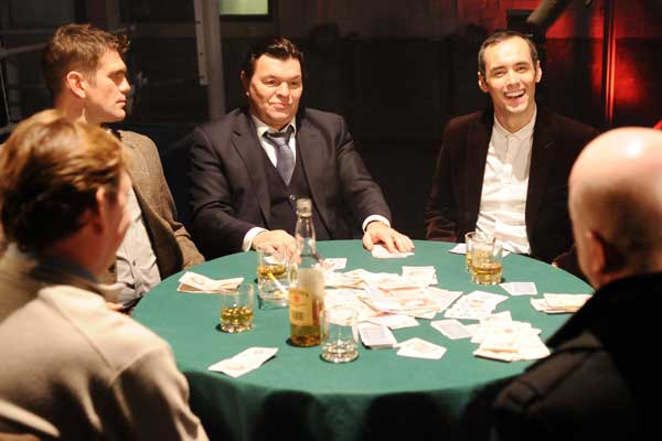 The men of Walford settle down for a poker night