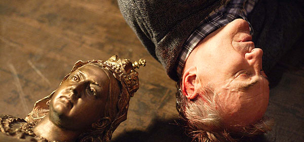 Archie lay next to the Queen Vic bust