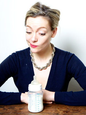 Cherry Healey with a baby's bottle full of milk