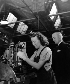 Picture showing 'Music While You Work' organiser Mr Wynford Reynolds on a factory visit.