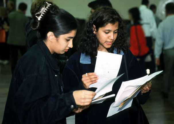 Students looking at their exam results