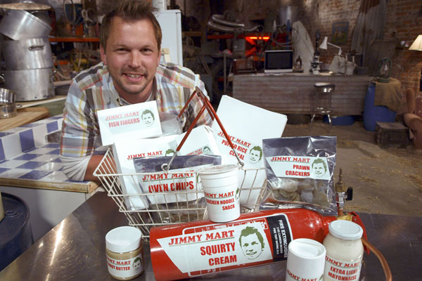 Jimmy with a basket of Jimmy Mart goods